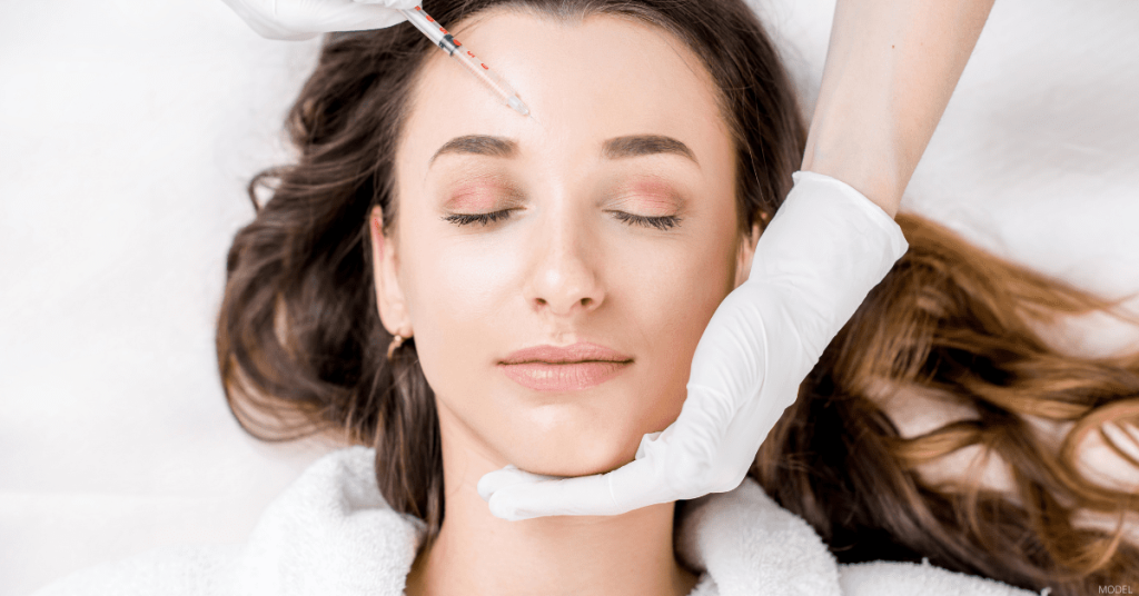 A woman receives a BOTOX® Cosmetic injection.